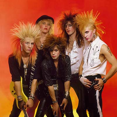 heavy metal band Whitesnake posing for promo images circa 1980's